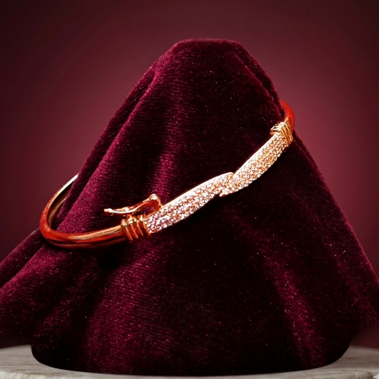 Elegant Gold-Plated Twisted Wave Bangle with White Stones