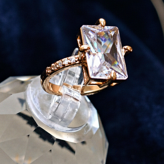 Golden Adjustable Ring with White Rectangular Stone – Free Size